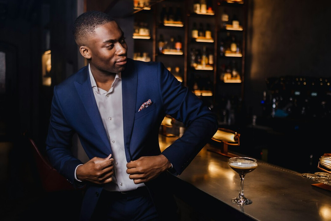 Confident man in a suit smiling